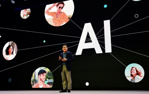 Samsung Electronics CEO JH Han highlights AI developments at a CES press event in Las Vegas