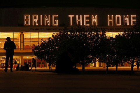 A neon sign in Tel Aviv says 'Bring them home', referring to the hostages held in Gaza since the October 7, 2023 Hamas attacks