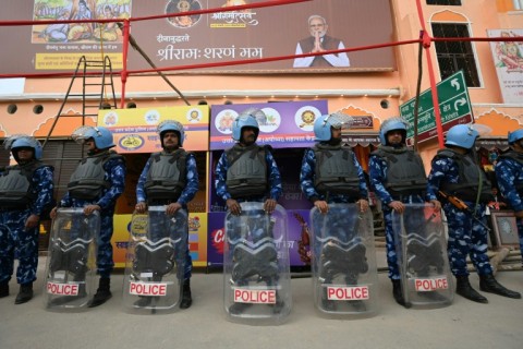 Security personnel stand guard in Ayodhya: many of India's 200 million Muslims, already anxious in a climate of increased sectarian tensions, have watched the clamour around the temple with trepidation