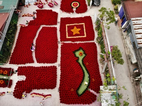 The villagers cater to the selfie snappers, including by arranging incense in the form of a giant Vietnamese map
