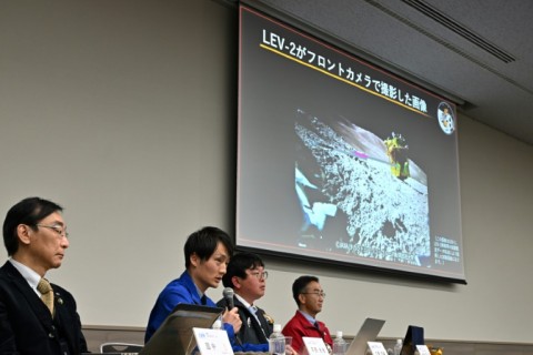 Members of the Japanese space agency JAXA explain an image of the lunar surface taken and transmitted by a surface robot deployed after the Smart Lander for Investigating Moon (SLIM) mission landed