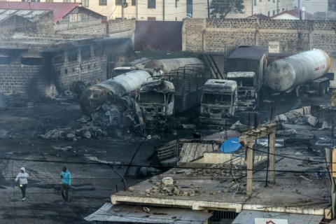 The blaze damaged houses, commercial properties and vehicles, according to the government spokesman 