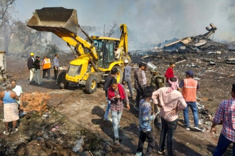 Flames reached high into the sky from the explosion at the fireworks factory, which destroyed entire buildings in a wide blast site