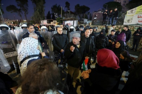 Palestinian riot police stand guard as protesters in Ramallah march against a visit by US Secretary of State Antony Blinken to Israel and the West Bank