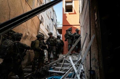 The Israeli army says this photograph shows troops operating inside Gaza at an unspecified location