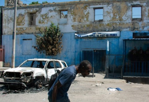 In the latest violence, gunfire shut down some flights at Toussaint Louverture International Airport in Haiti's capital