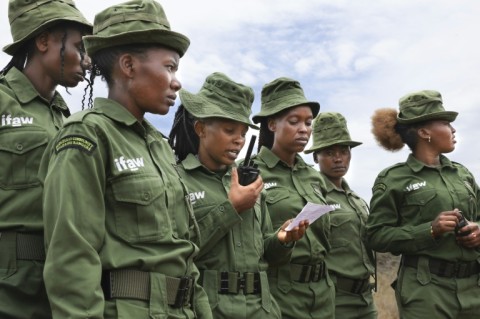 Team Lioness members relay data on radio of wildlife sightings 