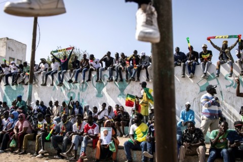 Excited spectators found vantage points on walls and roof terraces