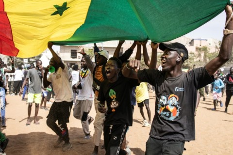 Thousands of Faye's supporters filled a sandy football pitch in a northern district of Dakar