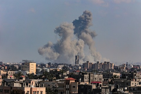 Smoke billows over Khan Yunis in the southern Gaza Strip during Israeli bombardment on March 11, 2024, amid ongoing battles between Israel and the Palestinian militant group Hamas