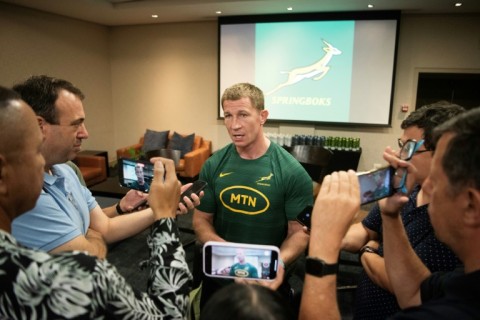 Springbok's Irish assistant coach for defence Jerry Flannery (C) talks to journalists in Cape Town