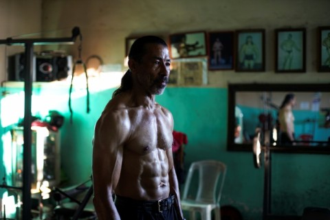 Former bodybuilding champion Walter Perez, 61, is seen in his gym in Nicaragua during an interview with AFP 