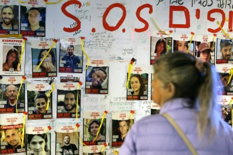 Pictures of hostages held by Palestinian militants in the Gaza Strip since the October 7 attacks, displayed outside the Tel Aviv Museum of Art