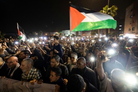 Thousands of people protested in Morocco's commercial capital Casablanca against 'massacres' in the Gaza Strip and against the country's ties with Israel