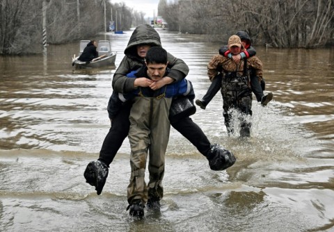 Overflowing rivers had covered whole villages and towns in northern Kazakhstan and Russia's southern Urals 