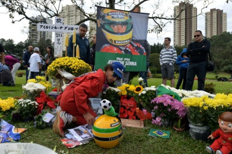 Fans of Ayrton Senna at his grave in Sao Paulo, on May 1, 2014, on the 20th anniversary of his death