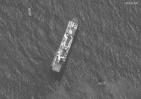 A US vessel and sections of a floating dock, off the war-torn Gaza Strip, seen in a satellite image courtesy of Maxar Technologies taken on April 29, 2024 