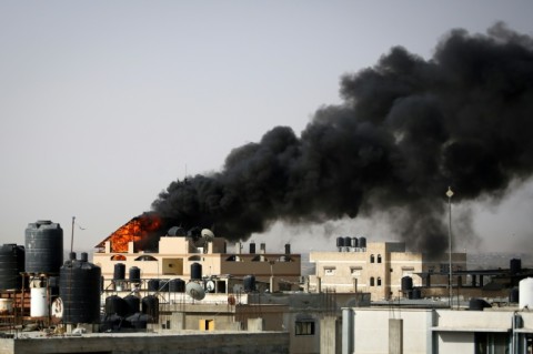 Smoke rises from a fire after Israeli bombardment in Rafah, whose eastern sector Israeli troops have entered despite international objections