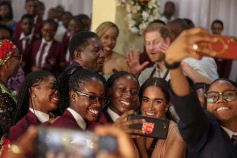 Harry and Meghan arrived Friday in Nigeria as part of the prince's promotion of his Invictus Games