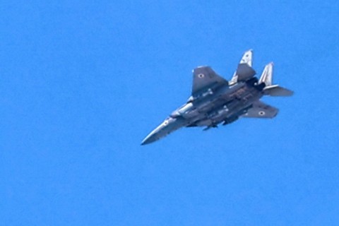 An Israeli air force fighter jet flies over the northern Gaza Strip 