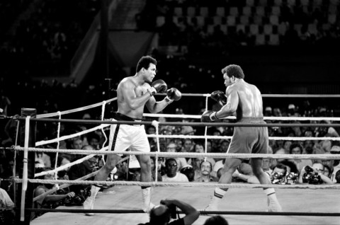 Muhammad Ali (L) reclaiming his world titles from George Foreman in Kinshasa, Zaire, in 1974