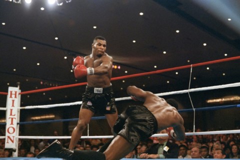 Mike Tyson floors Trevor Berbick in the second round in 1986 to become the youngest world heavyweight champion