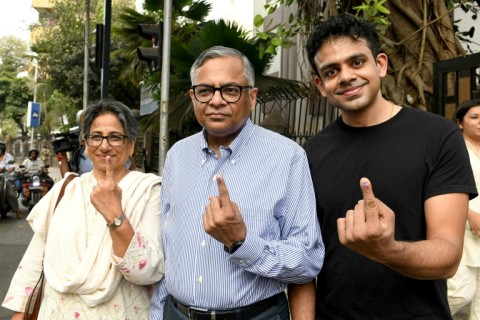 Natarajan Chandrasekaran  of India's conglomerate Tata Sons, with his family after casting  ballots in Mumbai on May 20, 2024 