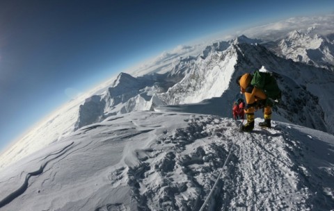 Mountaineers make their way to the summit of Mount Everest, as they ascend on the south face from Nepal