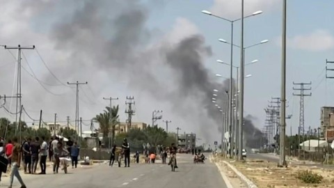 Smoke rises in Rafah, seen from Khan Yunis