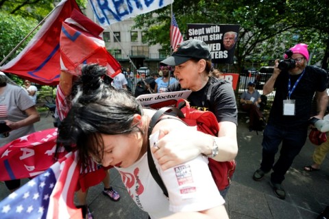 Clashing protesters have gathered outside the courthouse where Donald Trump is awaiting his verdict