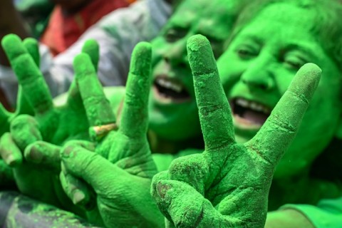 Supporters of India's Trinamool Congress (TMC) celebrate in Kolkata