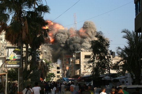 A ball of fire and black smoke after an Israeli air strike targeted a residential building in Bureij in central Gaza