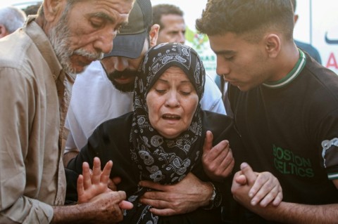 A Palestinian woman mourns a relative killed in an Israeli strike, at the Al-Aqsa Martyrs Hospital in Deir al-Balah in the central Gaza Strip on June 2, 2024