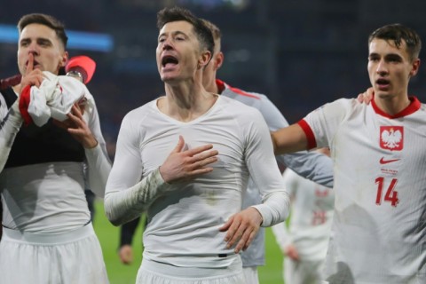 Robert Lewandowski (C) was vital in Poland scraping past Wales in a penlty shoot-out in the play-offs