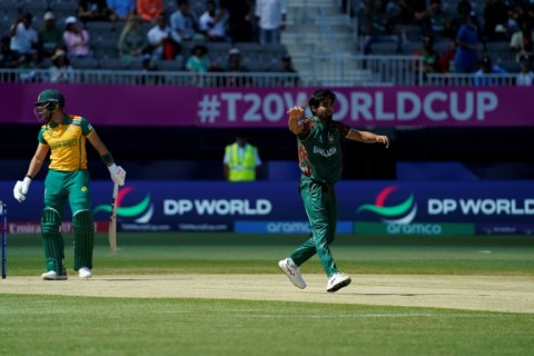 Man of the moment: Bangladesh fast bowler Tanzim Hasan Sakib on his way to three wickets in his opening spell