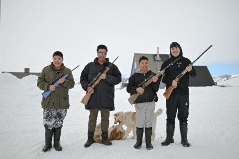 Peter Hammeken (2nd left) and his sons. Hunting is not just a way of life for the Inuit of Ittoqqortoormiit, it is needed for survival