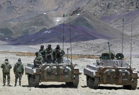 Armoured vehicles of the Indian army sit at a military camp in eastern Ladakh