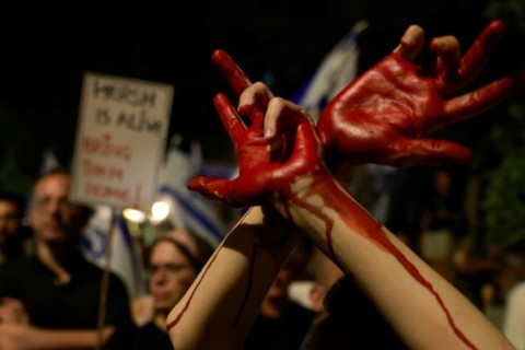 Protesters opposed to Israeli Prime Minister Benjamin Netanyahu and seeking a deal to bring home hostages from Gaza, demonstrate outside his Jerusalem residence