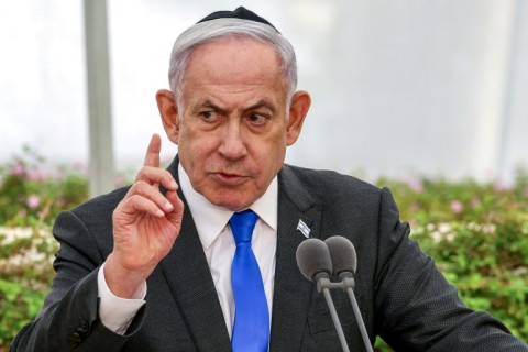 Israeli Prime Minister Benjamin Netanyahu, shown during a ceremony on June 18, 2024, has vowed to remain in Gaza 'until all of the hostages return'