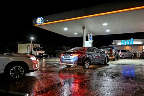 Cars line up at a gas station as Hurricane Beryl heads towards Bridgetown, Barbados, on June 29, 2024