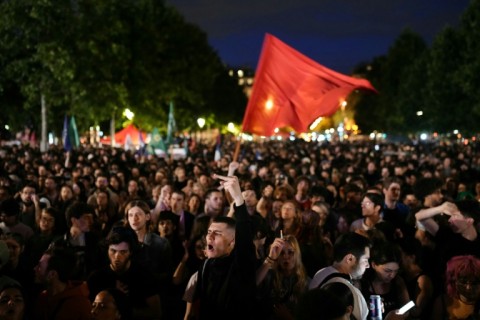 Crowds gathered in central Paris after the results were announced to protest the far right