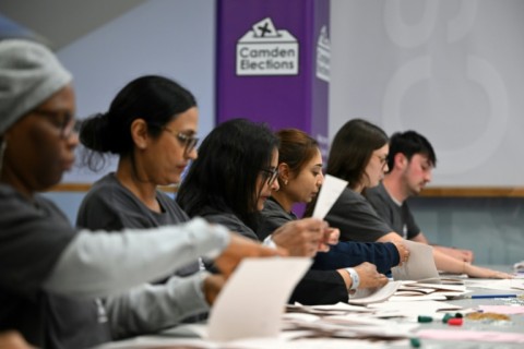 Ballots are counted through the night