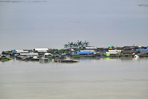 Heavy rains and overflowing rivers have swamped parts of India's northeastern state of Assam