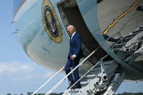 US President Joe Biden steps off Air Force One upon arrival at Detroit Metropolitan Wayne County Airport