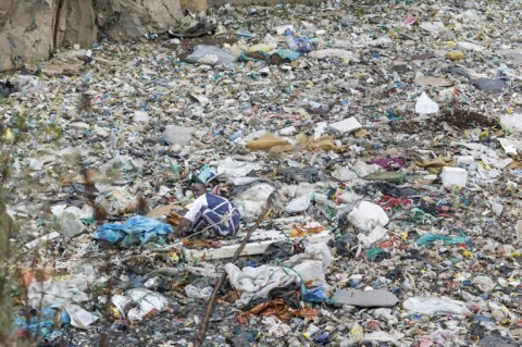 Volunteers have been combing through the rubbish dump in the hunt for bodies 