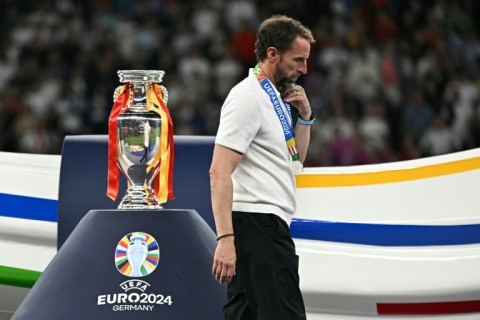 Gareth Southgate walks past the Euros trophy following the defeat to Spain