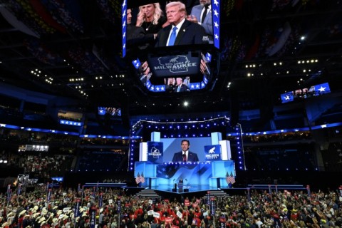 Donald Trump watches as Florida governor Ron DeSantis speaks during the Republican National Convention