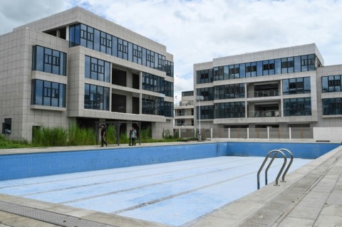 Luxury apartments and swimming pool inside the scam centre in Bamban