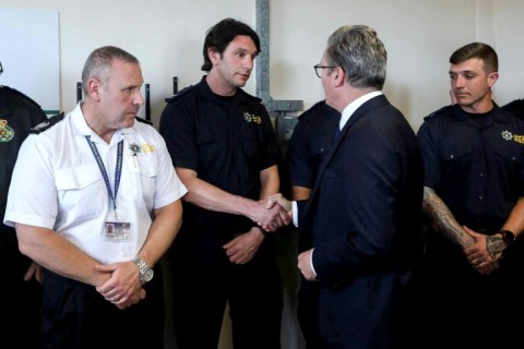 Britain's Prime Minister Keir Starmer met with emergency responders who went to the scene of a knife attack 