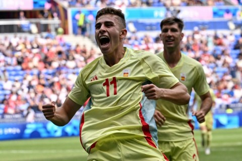 Fermin Lopez celebrates scoring his and Spain's first goal in their Olympic men's football quarter-final against Japan in Lyon